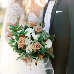 A bride holding a beautiful bouquet of flowers