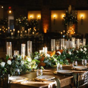 A picture of the table decorated with lights and flowers