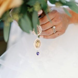 A closeup of the bride holding the bouquet