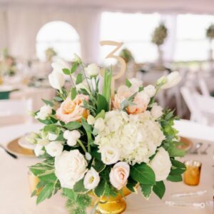 A picture of the flower bouquet on the dinner table