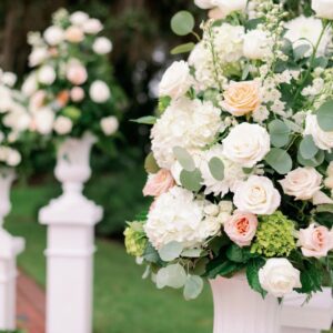 White color Flower bouquets on the walkway