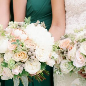 A picture of the woman holding flower bouquets