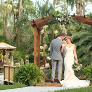 A couple posing for a picture at the wedding venue